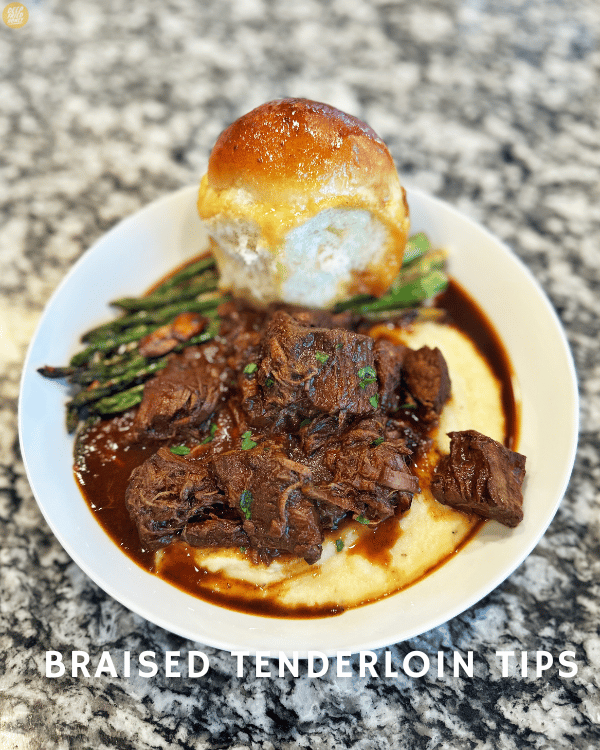 a bowl of Braised Tenderloin Tips over mashed potatoes